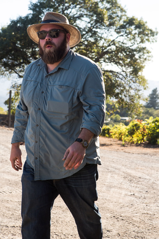 Chris Cottrell walking in a vineyard